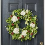 Close-up of blooms and berries on this Williamsburg Style Americana Fruit Wreath Front Door Wreath