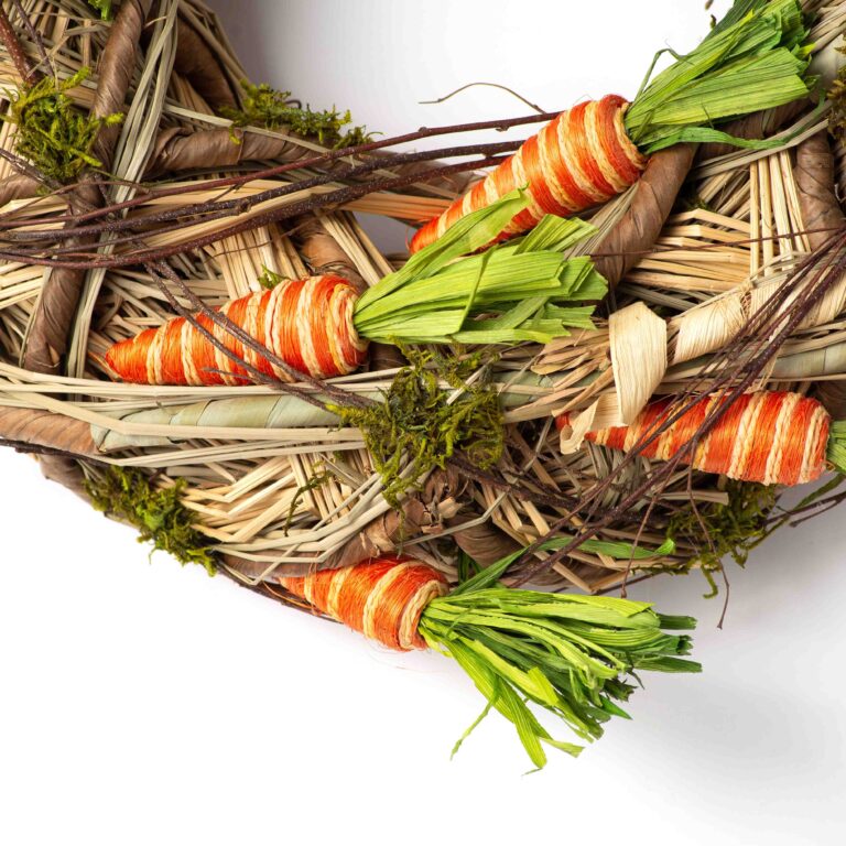 Close-up of blooms and berries on this Grass, Twig and Moss Woven Candle Ring Centerpiece