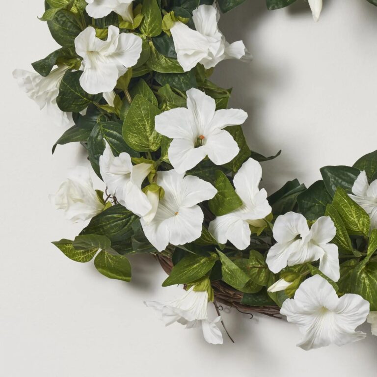 Close-up of blooms and berries on this Cascades of Blooming White Petunia Front Door Wreath