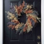 Alternate angle of the Dreamy Coral Fern On Front Door Wreath showing wreath face texture