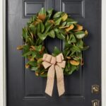 Alternate angle of the Classic Real Touch Magnolia Leaf Burlap Bow showing wreath face texture