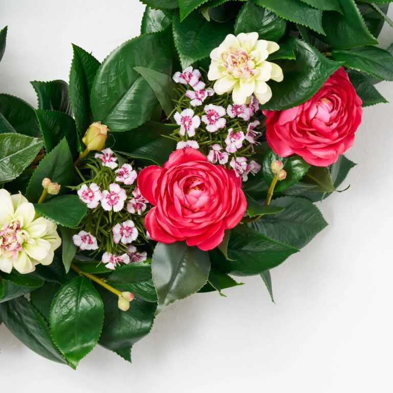 Close-up of blooms and berries on this Real Touch Camelia Leaf, Fuchsia Front Door Wreath