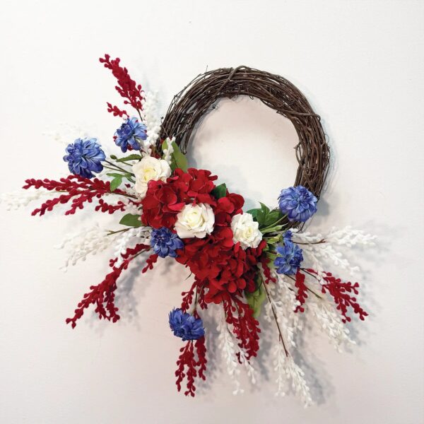 Close-up of blooms and berries on this Star Spangled - Red Hydrangea, Patriotic American Wreath
