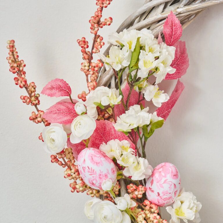 Close-up of blooms and berries on this Easter Tea House - Pink Front Door Wreath