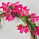 Close-up of blooms and berries on this Real Touch Climbing Fuchsia Pink Spring Summer Wreath