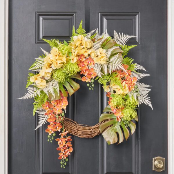 Close-up of blooms and berries on this Fern and Flora Fantasy Front Door Wreath
