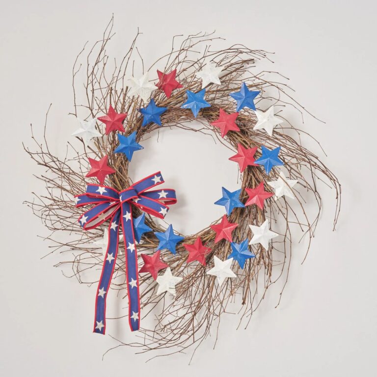 Close-up of blooms and berries on this Red, White and Blue Star Bow