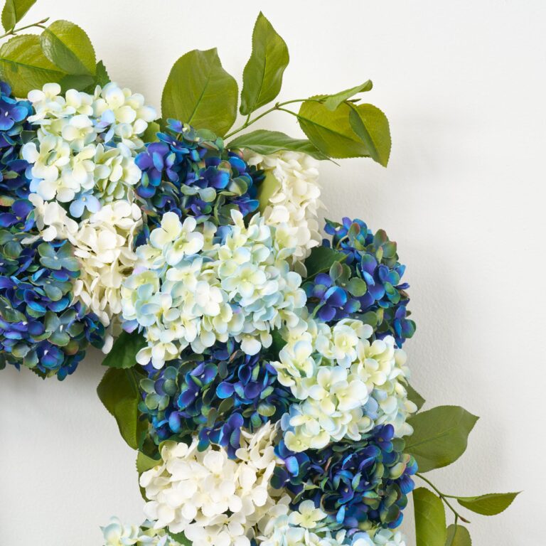 Close-up of blooms and berries on this Deluxe Mixed Blue and White Front Door Wreath