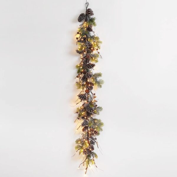 Close-up of greenery along the garland on this Snowy Norway Spruce and Pinecone Winter Christmas