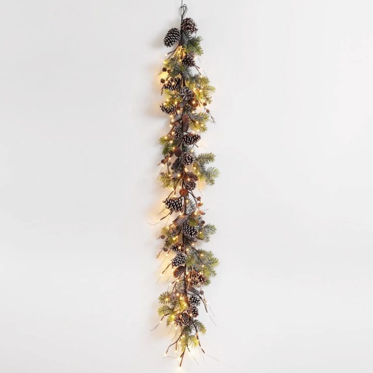 Close-up of greenery along the garland on this Snowy Norway Spruce and Pinecone Winter Christmas