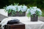 Second angle of the Soft Blue Hydrangea and Mixed Tin Window Planter focusing on planter