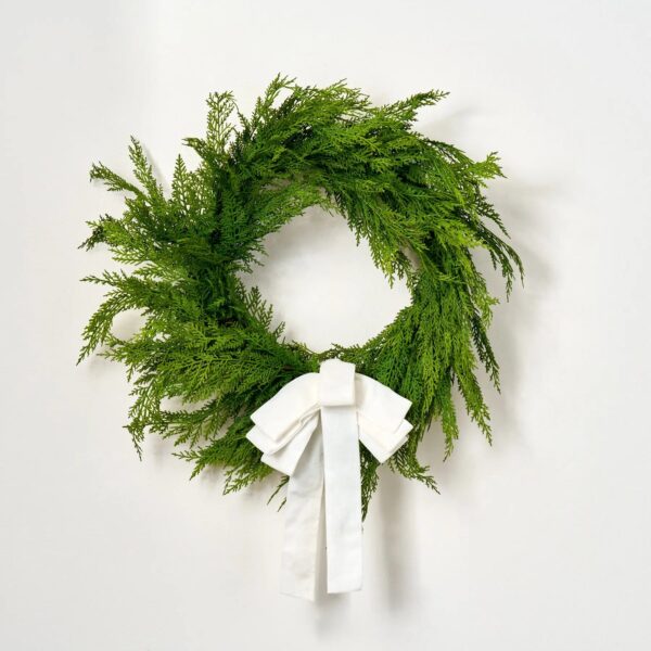 Close-up of blooms and berries on this Snow White Velvet Lux Hand Drape Loop Bow