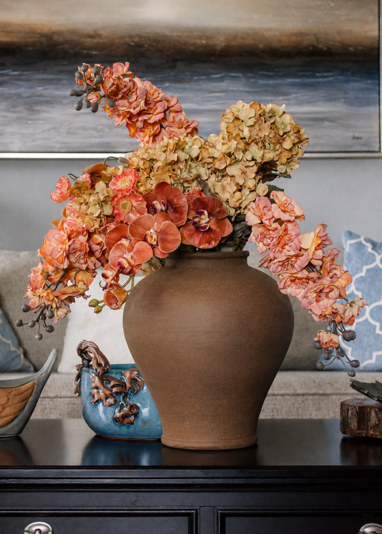 Close-up of bloom tips on this Real Touch Fake Phalaenopsis Orchid in Burnt Orange