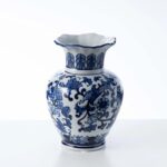 Side view of the Blue and White Porcelain Chinoiserie Vessel Collection decorative vase revealing bloom