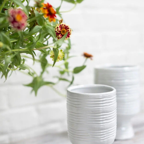 Close-up of vase silhouette detail on this White Glazed Lined Ceramic Retro Textured Vase Pot