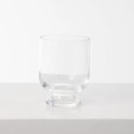 Alternate angle of the Clear GlassFooted Bowl Urn Flower Flower Hollis Vase showing bloom arrangement