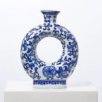 Second angle of the Blue and White Porcelain Chinoiserie Vessel Collection decorative vase focusing on