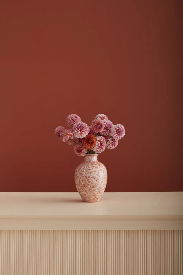 Close-up of leaf foliage texture on this Coral Orange and White Hand Eleanor Flower Vase