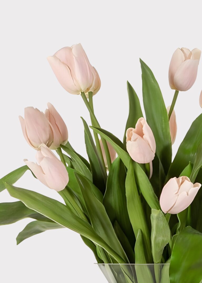 Close-up of vase silhouette detail on this Pink Artificial Tulip Arrangement Footed Glass Vase