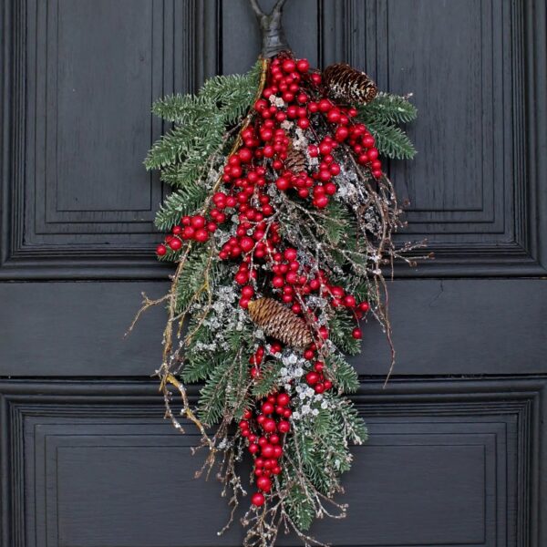 Close-up of swag tail detail on this Waterproof Red Berry, Pinecone Door Holiday Swag