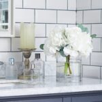 Close-up of vase silhouette detail on this White Hydrangea and Eucalyptus Water Glass Cylinder Vase