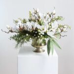 Detail view of stem and foliage layering from the Winter White Magnolia, Pine Silver Metal