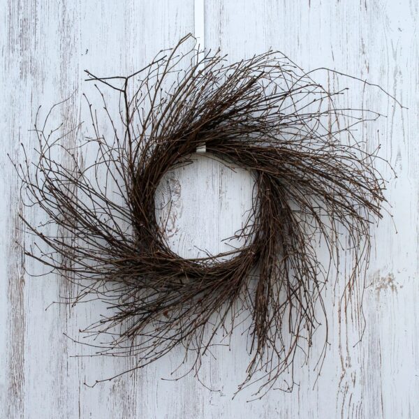 Close-up of blooms and berries on this Wispy Natural Birch Twig Everyday Wreath Base