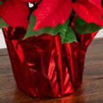Detail view of planter detail from the 13 inch Artificial Poinsettia Arrangement Red Wrapped Planter