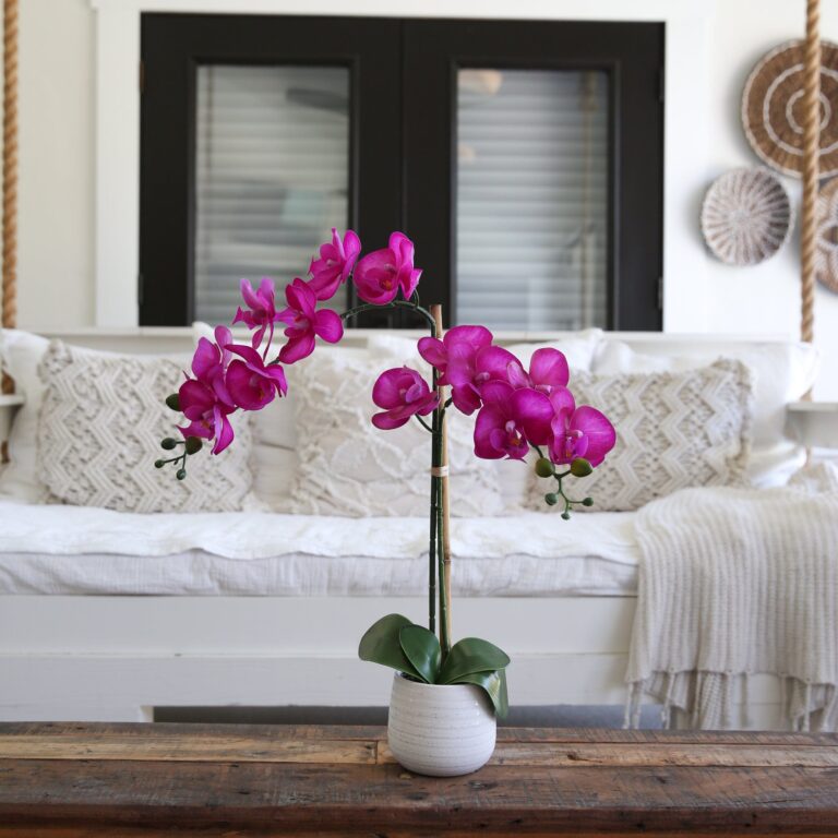 Close-up of vase silhouette detail on this 19' Artificial Purple Orchid with Decorative Vase