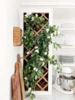 Close-up of leaf foliage texture on this 19' Mixed Stephanotis and Ivy Hanging Artificial Plant