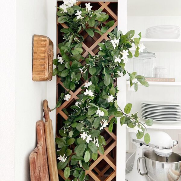 Close-up of leaf foliage texture on this 19' Mixed Stephanotis and Ivy Hanging Artificial Plant