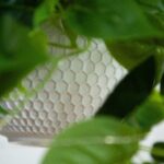 Close-up detail capturing material texture detail of the 24' UV Resistant Artificial Philodendron White Hanging