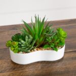 Detail view of planter detail from the 5 inch Artificial Succulent Garden Ceramic White Planter