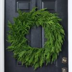 Close-up of blooms and berries on this Norfolk Collection - Real Touch Wreath without Ribbon