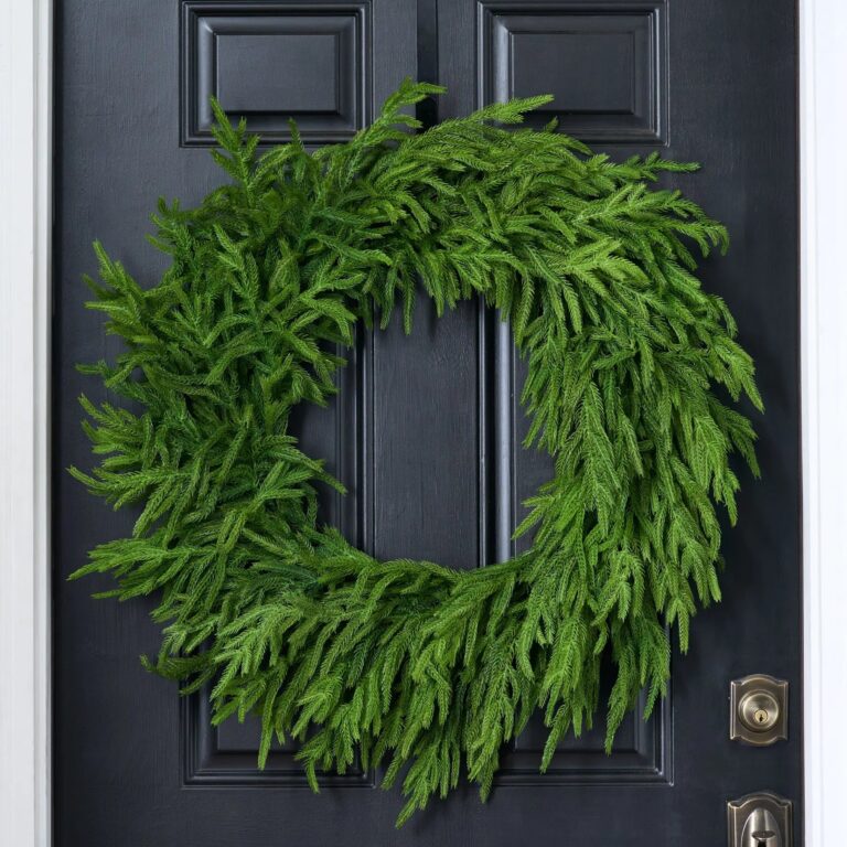Close-up of blooms and berries on this Norfolk Collection - Real Touch Wreath without Ribbon