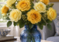 Artificial yellow silk roses from lemon to amber in a blue vase