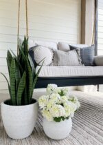 Side view of the UV Treated Outdoor Fake Potted Sansevieria Snake Plant revealing frond and