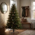 Noble Fir Artificial Christmas Tree - styled in an entryway foyer with a wooden bench, styled lifestyle scene